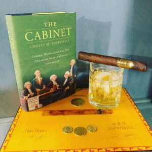 A good book, a cigar and glass of bourbon